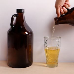 Glass growler bottle with cap for beer